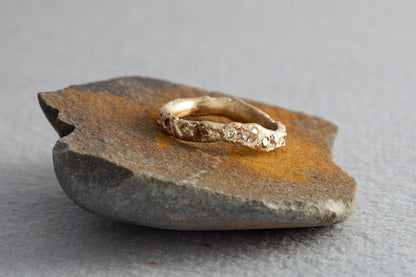 Organic textured gold wedding ring, unique handcrafted design from North Devon