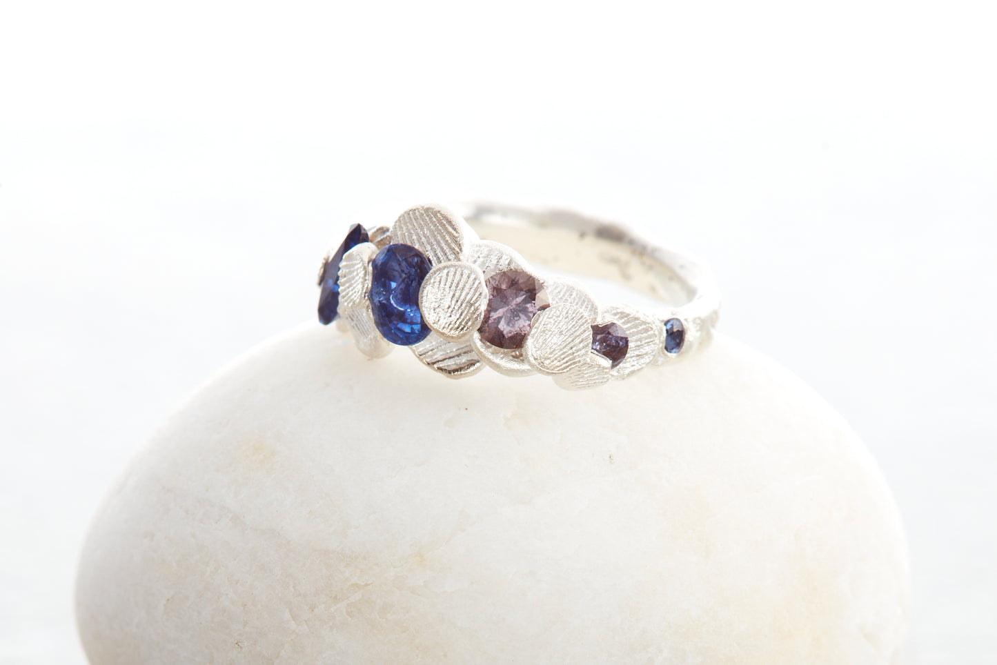 Artisan silver Shellscape ring with tide pool inspired sapphires and coastal seaweed colour details